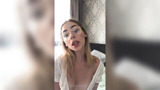 Irina Sivalnaya with glasses shows her sex toy