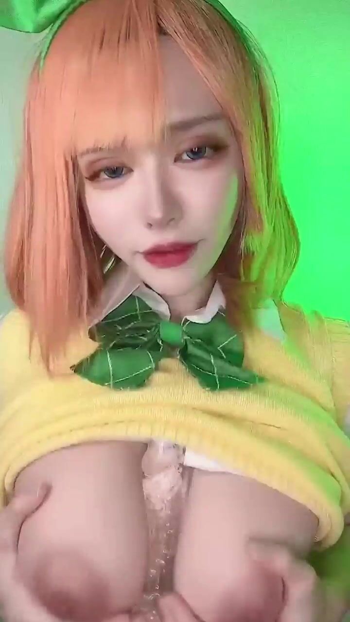 Crybaby0430 teasingly adjusting her costume