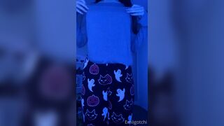 Emi in Halloween pants shows her boobs