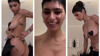 Mia Khalifa fur coat striptease