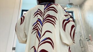 PeachJars takes off her robe in the bathroom