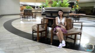 Rae Flashing in a Store