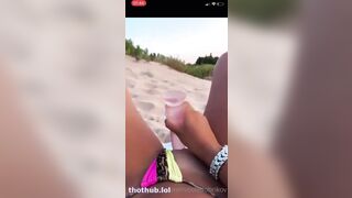 Nicole Dobrikov playing with her dildo on the Beach