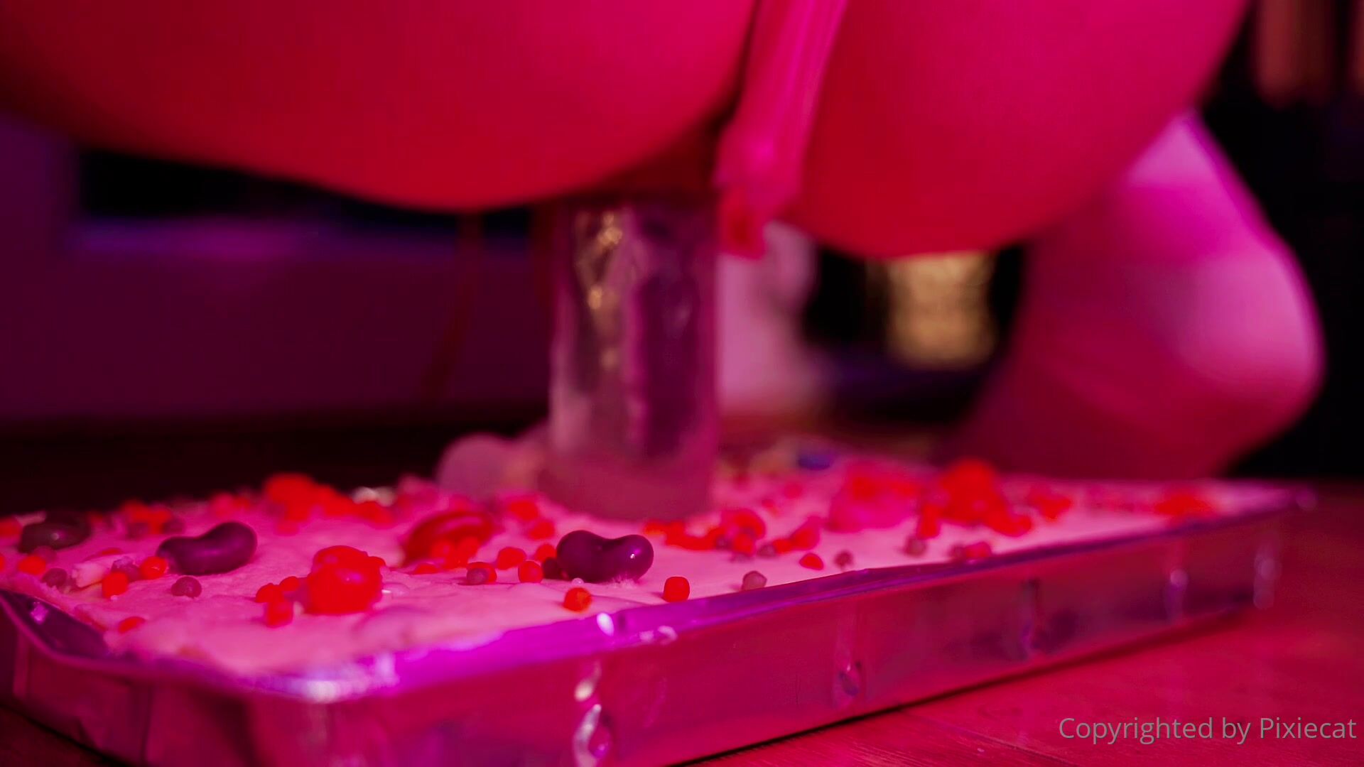 Pixiecat Riding a dildo on a cake