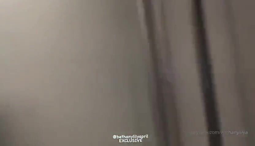 Beth lily in shower