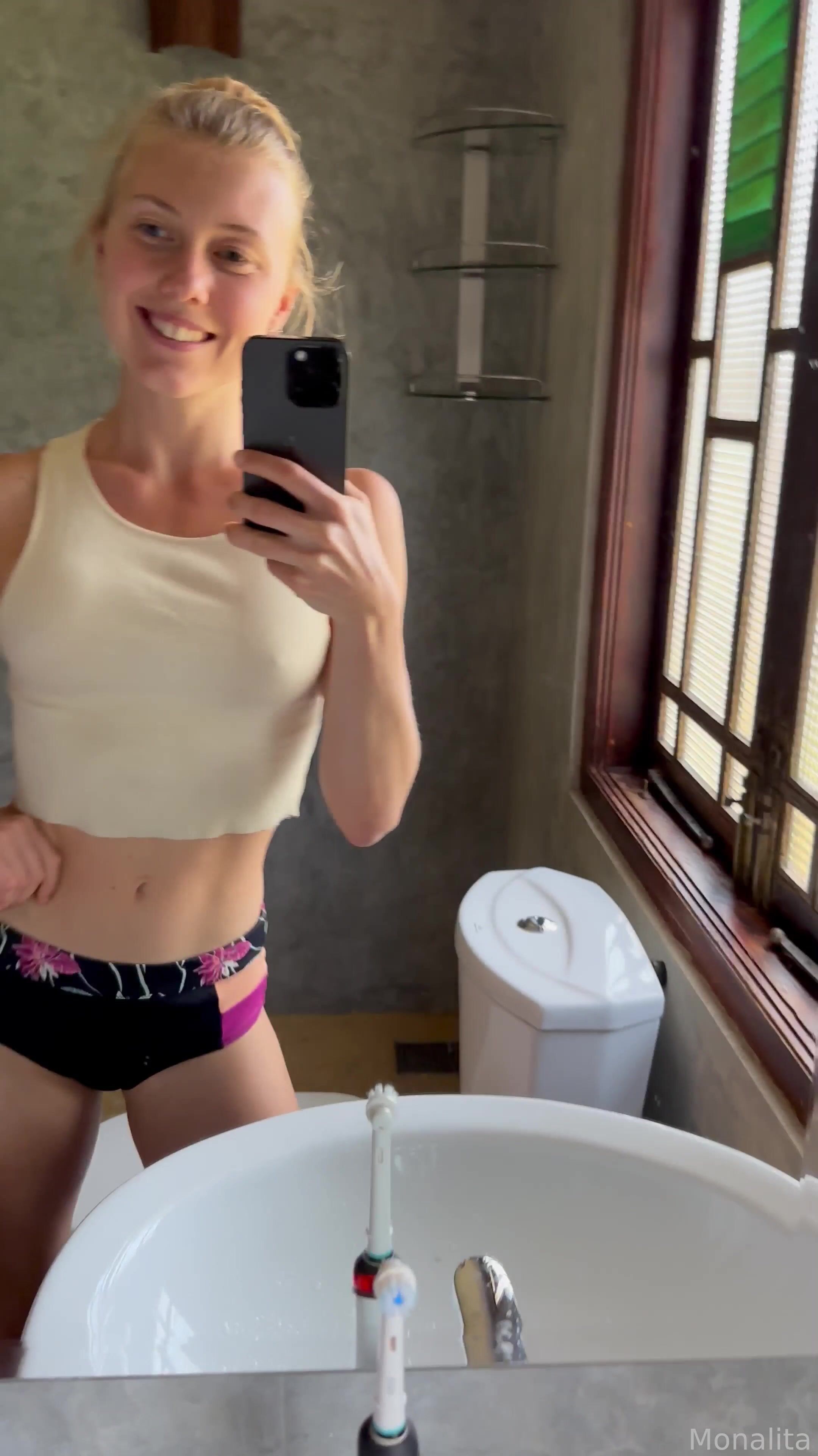 Monalita - dancing in hotel bathroom